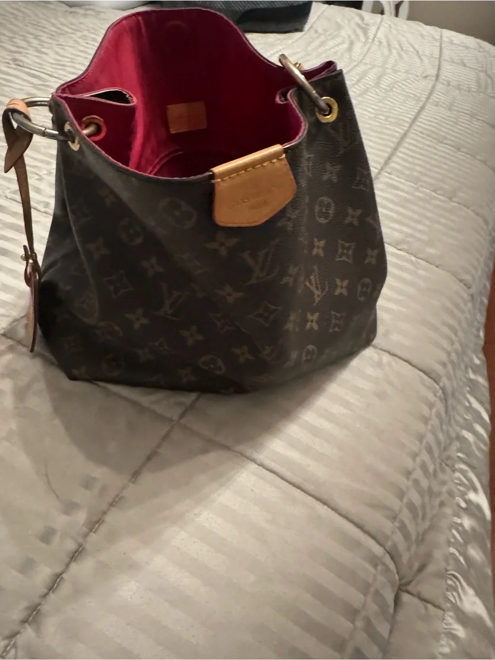 Louis Vuitton Monogram Bucket Bag with Burgundy Interior